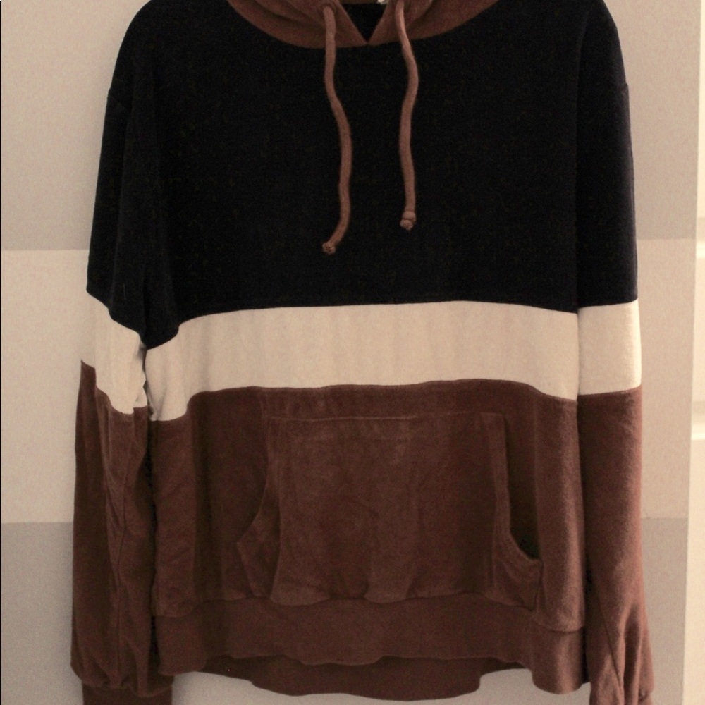Navy blue, white, and brown striped hoodie.